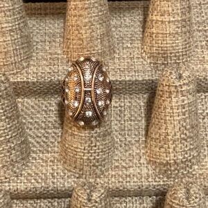 Elegant Gold and Silver Ring with Gem Accents